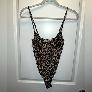 Semi-sheer cheetah print bodysuit